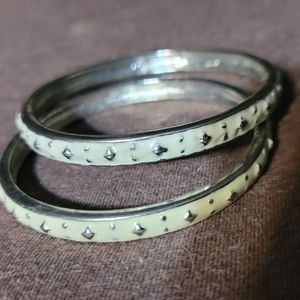 SET OF TWO BONE COLORED ENAMEL BRACELETS- STAR DESIGN
